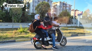 Bir ailenin tehlikeli scooter yolculuğu